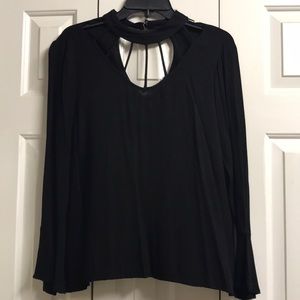 Black high neck bell sleeve top.